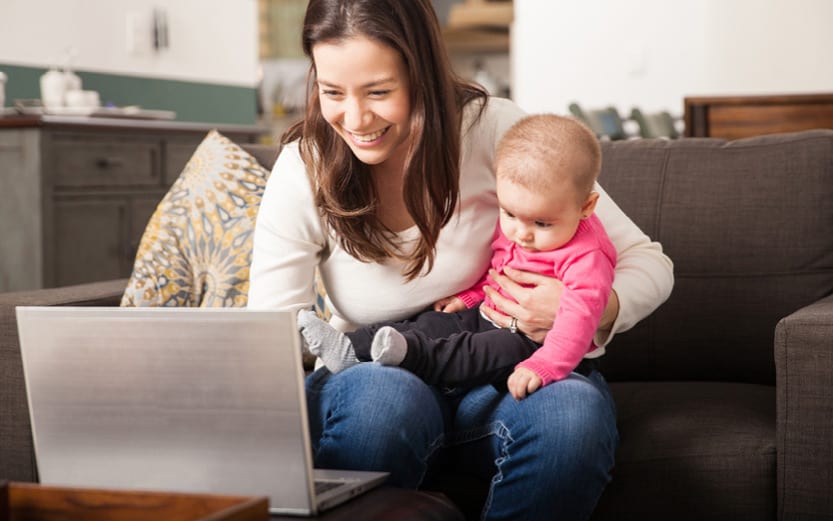 Young mother enrolling in benefits online