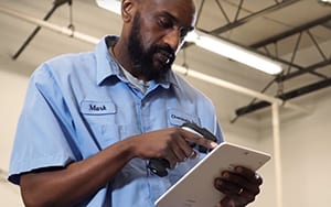 Man using ERP Suites Scanability on tablet
